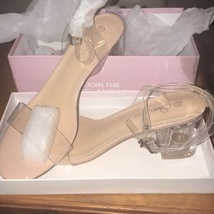 Ladies clear/nude dress sandal.